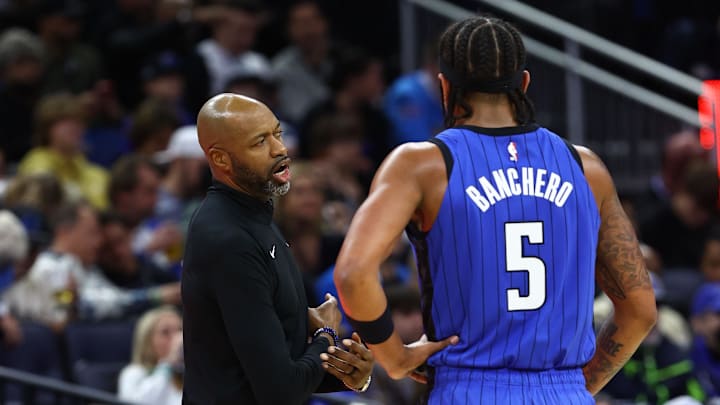 Dec 20, 2023; Orlando, Florida, USA; Orlando Magic head coach Jamahl Mosley talks with forward Paolo Banchero (5) in the first half against the Miami Heat at KIA Center. Mandatory Credit: Kim Klement Neitzel-Imagn Images Dec 20, 2023; Orlando, Florida, USA; Orlando Magic head coach Jamahl Mosley talks with forward Paolo Banchero (5) in the first half against the Miami Heat at KIA Center. Mandatory Credit: Kim Klement Neitzel-Imagn Images