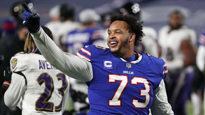 Bills Dion Dawkins celebrates with fans after Buffalo beat the Ravens 17-3