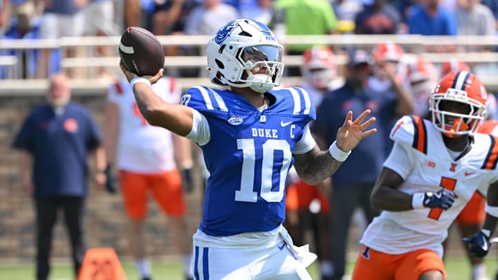 Sep 6, 2025; Durham, North Carolina, USA;  Duke Blue Devils quarterback Darian Mensah (10) throws a pass during the first quarter against the Illinois Fighting Illini at Wallace Wade Stadium. Mandatory Credit: Zachary Taft-Imagn Images