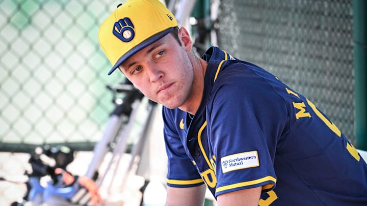 Milwaukee Brewers pitcher Jacob Misiorowski sits in the dugout during spring training workouts on Feb. 18, 2025, at American Family Fields of Phoenix.