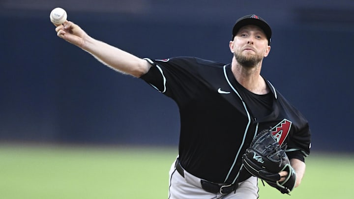 Jul 8, 2025; San Diego, California, USA; Arizona Diamondbacks starting pitcher Merrill Kelly (29) delivers during the first inning against the San Diego Padres at Petco Park. Mandatory Credit: Denis Poroy-Imagn Images Jul 8, 2025; San Diego, California, USA; Arizona Diamondbacks starting pitcher Merrill Kelly (29) delivers during the first inning against the San Diego Padres at Petco Park. Mandatory Credit: Denis Poroy-Imagn Images