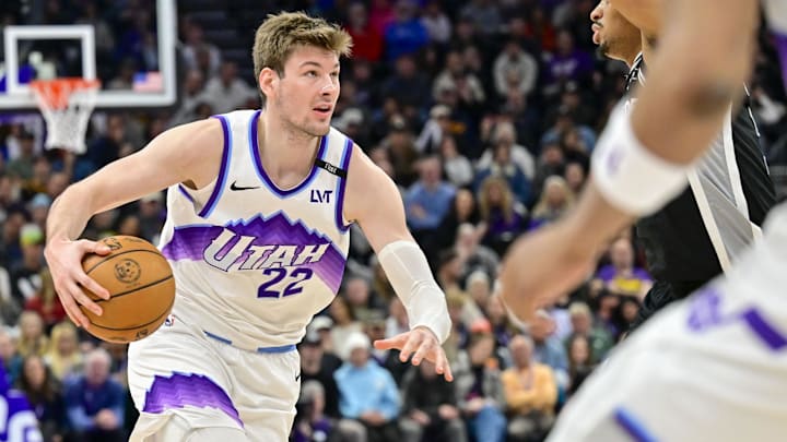 Jan 22, 2026; Salt Lake City, Utah, USA; Utah Jazz center Kyle Filipowski (22) dribbles during the second half against the San Antonio Spurs at Delta Center. Mandatory Credit: Peter Creveling-Imagn Images