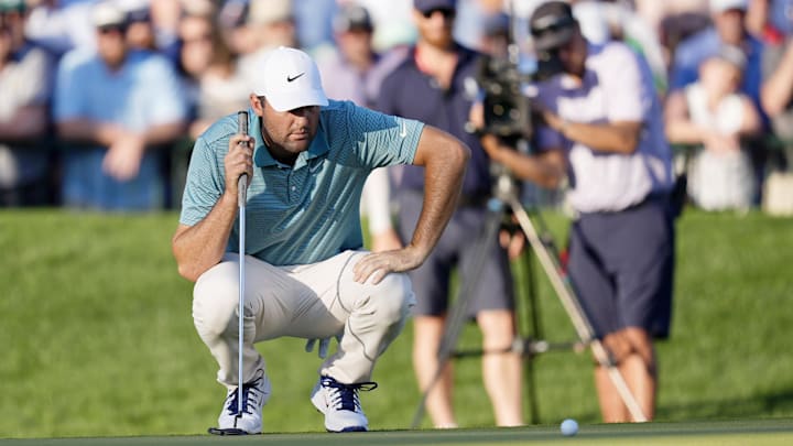 Scottie Scheffler lined up this birdie putt on the 18th Saturday and holed it, giving him a three-shot lead after 54 holes.