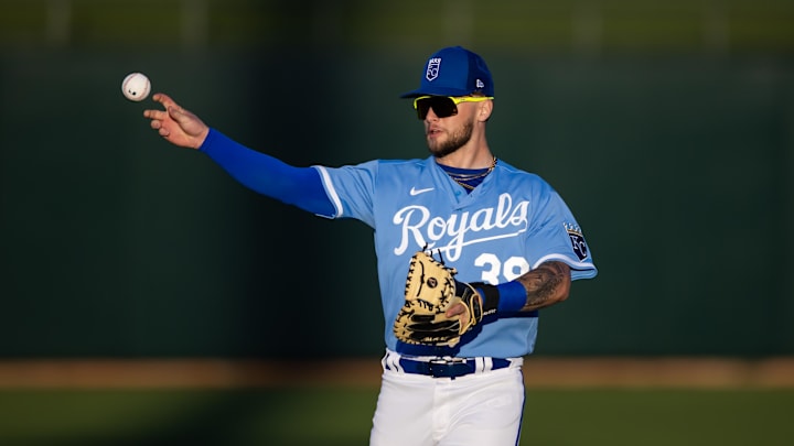 Mar 4, 2023; Surprise, Arizona, USA; Kansas City Royals designated hitter Carter Jensen against the Los Angeles Dodgers during a spring training game at Surprise Stadium. Mandatory Credit: Mark J. Rebilas-Imagn Images Mar 4, 2023; Surprise, Arizona, USA; Kansas City Royals designated hitter Carter Jensen against the Los Angeles Dodgers during a spring training game at Surprise Stadium. Mandatory Credit: Mark J. Rebilas-Imagn Images
