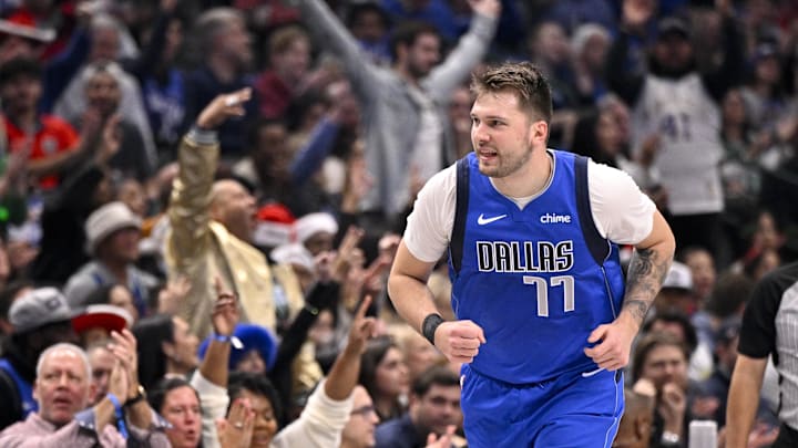 Dec 25, 2024; Dallas, Texas, USA; Dallas Mavericks guard Luka Doncic (77) celebrates after making a basket against the Minnesota Timberwolves during the first quarter at the American Airlines Center. Mandatory Credit: Jerome Miron-Imagn Images
