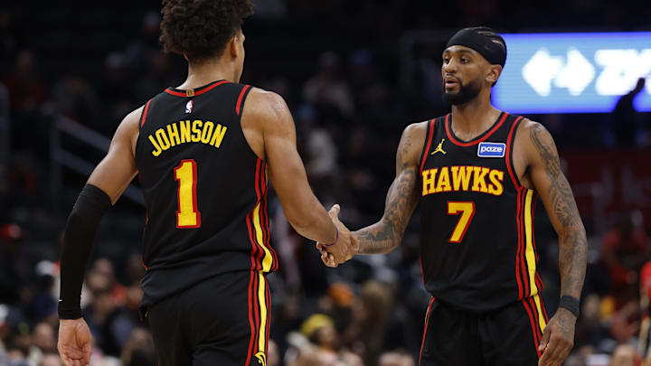 Dec 6, 2025; Washington, District of Columbia, USA; Atlanta Hawks forward Jalen Johnson (1) celebrates with Hawks guard Nickeil Alexander-Walker (7) after scoring while being fouled against the Washington Wizards in the second half at Capital One Arena. Mandatory Credit: Geoff Burke-Imagn Images Dec 6, 2025; Washington, District of Columbia, USA; Atlanta Hawks forward Jalen Johnson (1) celebrates with Hawks guard Nickeil Alexander-Walker (7) after scoring while being fouled against the Washington Wizards in the second half at Capital One Arena. Mandatory Credit: Geoff Burke-Imagn Images