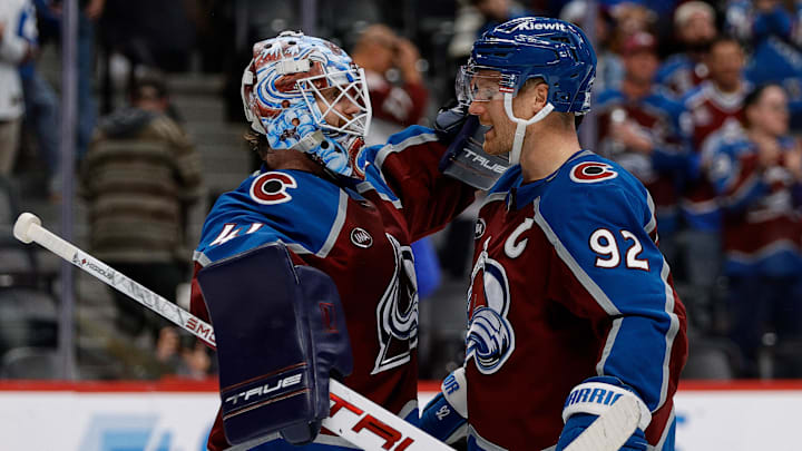 Nov 11, 2025; Denver, Colorado, USA; Colorado Avalanche goaltender Scott Wedgewood (41) celebrates with left wing Gabriel Landeskog (92) after the game against the Anaheim Ducks at Ball Arena. Mandatory Credit: Isaiah J. Downing-Imagn Images