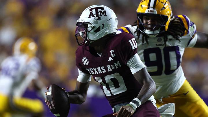 Sep 26, 2026; Baton Rouge, Louisiana, USA; Texas A&M Aggies quarterback Marcel Reed (10) scrambles under pressure during the third quarter against the LSU Tigers at Tiger Stadium. Mandatory Credit: Stephen Lew-Imagn Images Sep 26, 2026; Baton Rouge, Louisiana, USA; Texas A&M Aggies quarterback Marcel Reed (10) scrambles under pressure during the third quarter against the LSU Tigers at Tiger Stadium. Mandatory Credit: Stephen Lew-Imagn Images