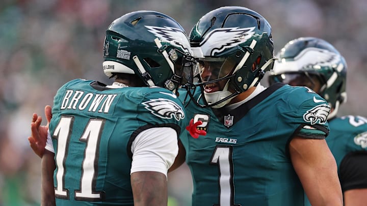 Jan 26, 2025; Philadelphia, PA, USA; Philadelphia Eagles quarterback Jalen Hurts (1) and wide receiver A.J. Brown (11) celebrate after a touchdown against the Washington Commanders during the first half in the NFC Championship game at Lincoln Financial Field. Mandatory Credit: Bill Streicher-Imagn Images