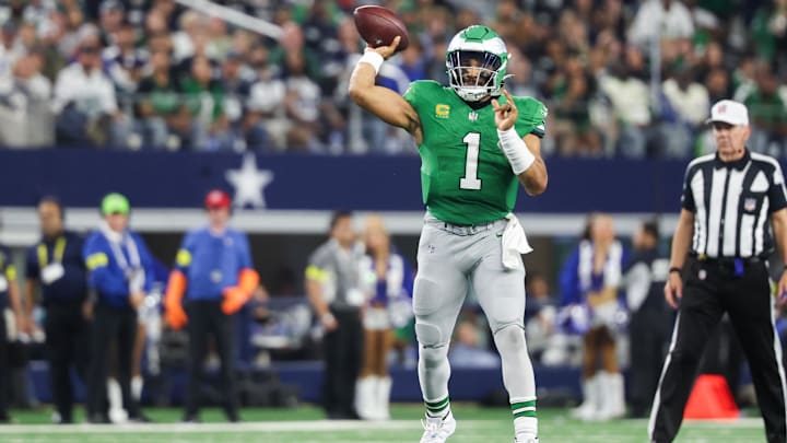 Nov 23, 2025; Arlington, Texas, USA; Philadelphia Eagles quarterback Jalen Hurts (1) throws the ball in the fourth quarter against the Dallas Cowboys at AT&T Stadium. Mandatory Credit: Kevin Jairaj-Imagn Images