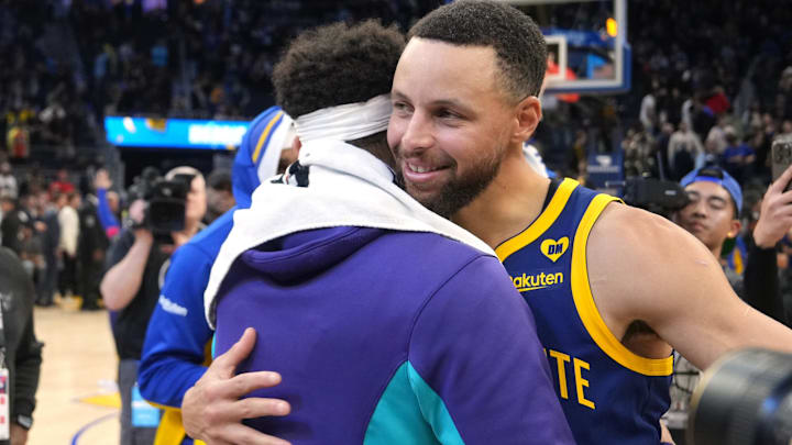 Golden State Warriors guard Stephen Curry (right) hugs Charlotte Hornets guard Seth Curry (left) after the game at Chase Center. Golden State Warriors guard Stephen Curry (right) hugs Charlotte Hornets guard Seth Curry (left) after the game at Chase Center.