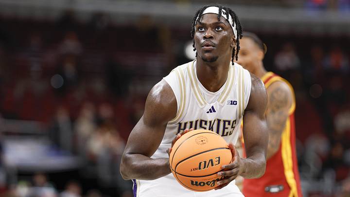 Mar 11, 2026; Chicago, IL, USA; Washington Huskies guard Zoom Diallo (5) shoots a free throw against the Southern California Trojans during the overtime at United Center. Mandatory Credit: Kamil Krzaczynski-Imagn Images