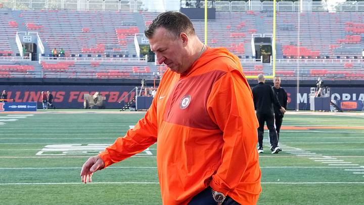 Illinois Fighting Illini head coach Bret Bielema walks across the field as the team arrives prior to the NCAA football game against the Ohio State Buckeyes at Gies Memorial Stadium in Champaign on Oct. 11, 2025.