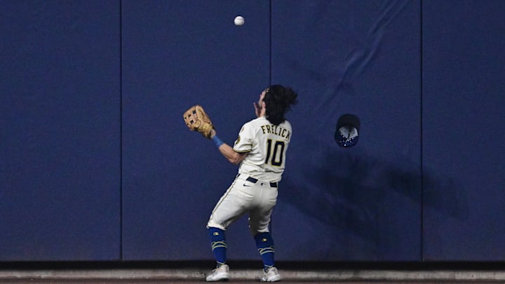 Oct 13, 2025; Milwaukee, Wisconsin, USA; Milwaukee Brewers center fielder Sal Frelick (10) fields a ball off the wall hit by Los Angeles Dodgers third baseman Max Muncy (13) during the fourth inning during game one of the NLCS round for the 2025 MLB playoffs at American Family Field. Mandatory Credit: Benny Sieu-Imagn Images