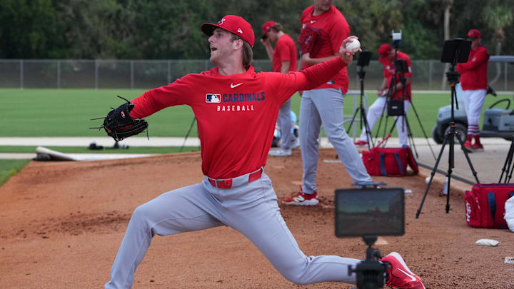 Feb 12, 2025; Jupiter, FL, USA;  St. Louis Cardinals pitcher Quinn Mathews throws during Spring Training. Mandatory Credit: Jim Rassol-Imagn Images
