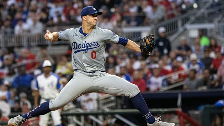 Sep 14, 2024; Cumberland, Georgia, USA; Los Angeles Dodgers pitcher Jack Flaherty (0) pitches the ball against the Atlanta Braves during the first inning at Truist Park. Sep 14, 2024; Cumberland, Georgia, USA; Los Angeles Dodgers pitcher Jack Flaherty (0) pitches the ball against the Atlanta Braves during the first inning at Truist Park.