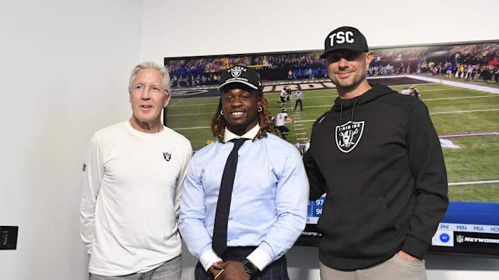 Apr 25, 2025; Henderson, NV, USA; (L-R) Las Vegas Raiders head coach Pete Carroll, Ashton Jeanty and general manager John Spytek pose after a news conference introducing Jeanty as the first round draft pick in the 2025 NFL Draft at Intermountain Health Performance Center. Mandatory Credit: Candice Ward-Imagn Images