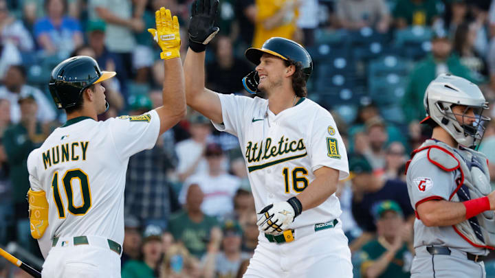 Jun 20, 2025; West Sacramento, California, USA; Athletics first baseman Nick Kurtz (16) celebrates with third baseman Max Muncy (10) after hitting a two run home run during the first inning against the Cleveland Guardians at Sutter Health Park. Mandatory Credit: Sergio Estrada-Imagn Images