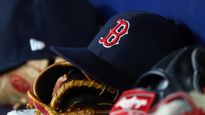 Sep 20, 2019; St. Petersburg, FL, USA; A detail view of Boston Red Sox hats and gloves at Tropicana Field. Mandatory Credit: Kim Klement-Imagn Images Sep 20, 2019; St. Petersburg, FL, USA; A detail view of Boston Red Sox hats and gloves at Tropicana Field. Mandatory Credit: Kim Klement-Imagn Images