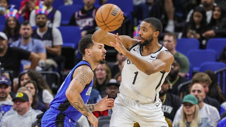 Feb 27, 2024; Orlando, Florida, USA; Brooklyn Nets forward Mikal Bridges (1) passes the ball around Orlando Magic guard Cole Anthony (50) during the second quarter at Amway Center. Mandatory Credit: Mike Watters-Imagn Images Feb 27, 2024; Orlando, Florida, USA; Brooklyn Nets forward Mikal Bridges (1) passes the ball around Orlando Magic guard Cole Anthony (50) during the second quarter at Amway Center. Mandatory Credit: Mike Watters-Imagn Images