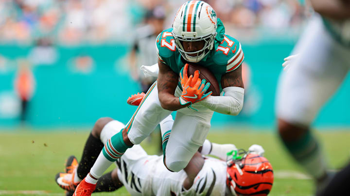 Dec 21, 2025; Miami Gardens, Florida, USA; Miami Dolphins wide receiver Jaylen Waddle (17) runs the ball during the second quarter against the Cincinnati Bengals at Hard Rock Stadium. Mandatory Credit: Sam Navarro-Imagn Images