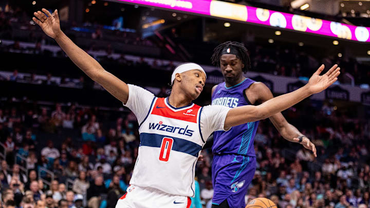 Mar 1, 2025; Charlotte, North Carolina, USA; Washington Wizards guard Bilal Coulibaly (0) celebrates after scoring against the Charlotte Hornets during the fourth quarter at Spectrum Center. Mandatory Credit: Scott Kinser-Imagn Images