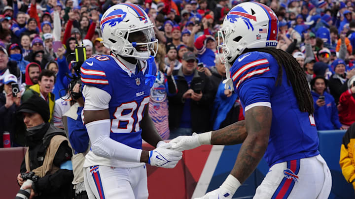 Buffalo Bills running back James Cook congratulates Buffalo Bills wide receiver Tyrell Shavers for scoring a touchdown. Buffalo Bills running back James Cook congratulates Buffalo Bills wide receiver Tyrell Shavers for scoring a touchdown.