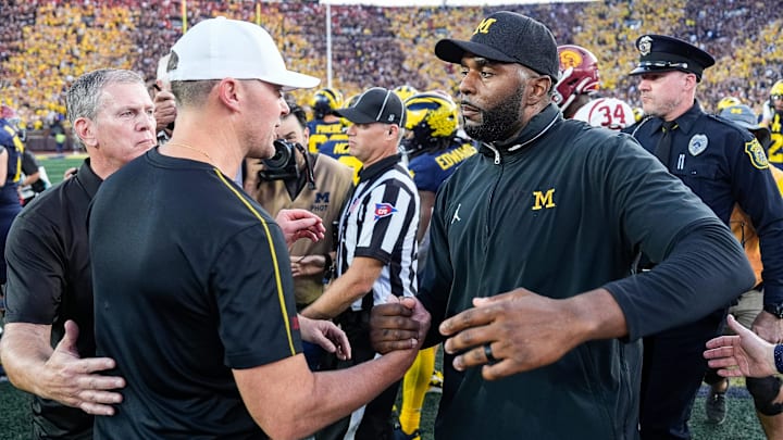 Michigan head coach Sherrone Moore shakes hands with USC head coach Lincoln Riley after 27-24 win at Michigan Stadium in Ann Arbor on Saturday, Sept. 21, 2024. Michigan head coach Sherrone Moore shakes hands with USC head coach Lincoln Riley after 27-24 win at Michigan Stadium in Ann Arbor on Saturday, Sept. 21, 2024.