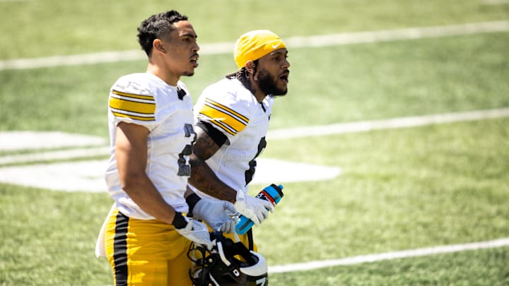 Apr 26, 2025; Iowa City, IA, USA; Iowa defensive backs TJ Hall (2) and Deshaun Lee (8) react during a spring NCAA football open practice at Kinnick Stadium. Mandatory Credit: Joseph Cress/For the Register