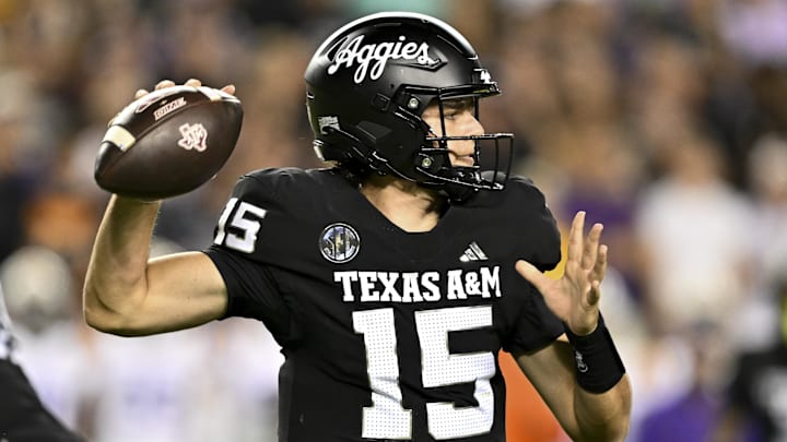 Texas A&M Aggies quarterback Conner Weigman (15) looks to pass the ball in the third quarter against the LSU Tigers at Kyle Field. Texas A&M Aggies quarterback Conner Weigman (15) looks to pass the ball in the third quarter against the LSU Tigers at Kyle Field.