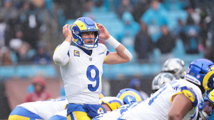 Nov 30, 2025; Charlotte, North Carolina, USA; Los Angeles Rams quarterback Matthew Stafford (9) calls a play during the fourth quarter against the Carolina Panthers at Bank of America Stadium. Mandatory Credit: Scott Kinser-Imagn Images