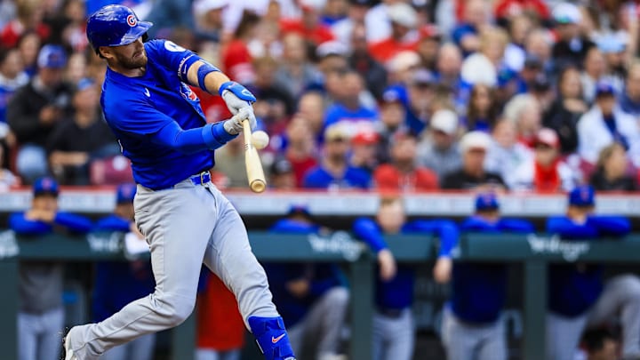 May 23, 2025; Cincinnati, Ohio, USA; Chicago Cubs catcher Carson Kelly (15) bats against the Cincinnati Reds in the second inning at Great American Ball Park. May 23, 2025; Cincinnati, Ohio, USA; Chicago Cubs catcher Carson Kelly (15) bats against the Cincinnati Reds in the second inning at Great American Ball Park.