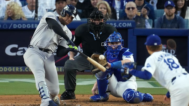 Oct 26, 2024; Los Angeles, California, USA; New York Yankees outfielder Juan Soto (22) hits a home run against the Los Angeles Dodgers pitcher Yoshinobu Yamamoto (18) in the third inning for game two of the 2024 MLB World Series at Dodger Stadium. Mandatory Credit: Kirby Lee-Imagn Images Oct 26, 2024; Los Angeles, California, USA; New York Yankees outfielder Juan Soto (22) hits a home run against the Los Angeles Dodgers pitcher Yoshinobu Yamamoto (18) in the third inning for game two of the 2024 MLB World Series at Dodger Stadium. Mandatory Credit: Kirby Lee-Imagn Images