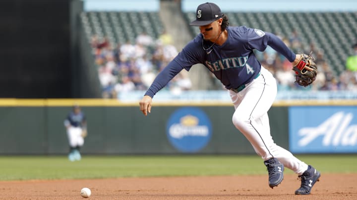 Seattle Mariners third baseman Josh Rojas recovers a ground ball during a game against the New York Yankees on Sept. 19 at T-Mobile Park.