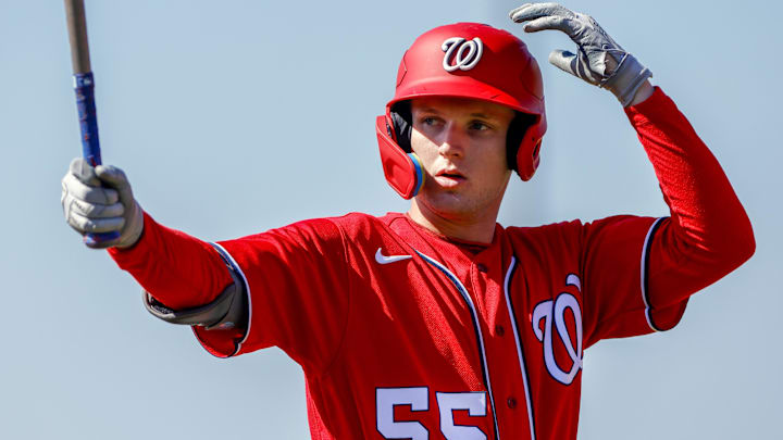 Feb 20, 2023; West Palm Beach, FL, USA; Washington Nationals outfielder Robert Hassell III (55) practices his swing during a spring training workout at The Ballpark of the Palm Beaches. Mandatory Credit: Sam Navarro-Imagn Images