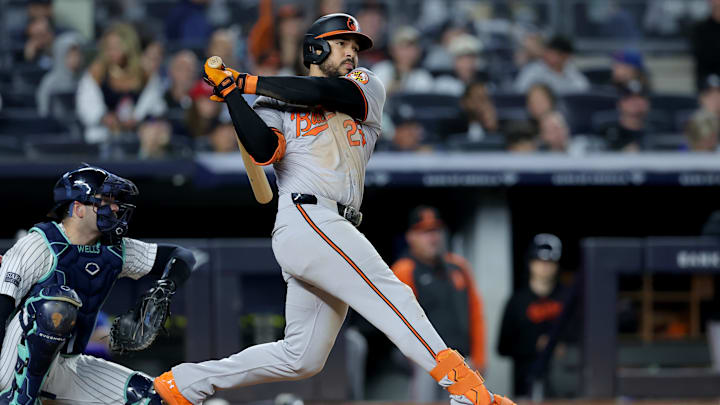 Sep 25, 2024; Bronx, New York, USA; Baltimore Orioles right fielder Anthony Santander (25) follows through on an RBI double against the New York Yankees during the fourth inning at Yankee Stadium. 