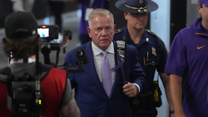 Sep 1, 2024; Paradise, Nevada, USA; LSU Tigers coach Brian Kelly arrives before the game against the Southern California Trojans  at Allegiant Stadium. Mandatory Credit: Kirby Lee-Imagn Images