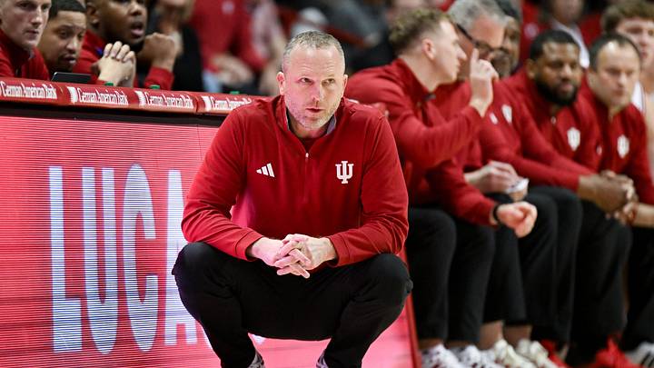 Dec 22, 2025; Bloomington, Indiana, USA; Indiana Hoosiers head coach Darian Devries looks on during the first half against the Siena Saints at Simon Skjodt Assembly Hall. Mandatory Credit: Robert Goddin-Imagn Images