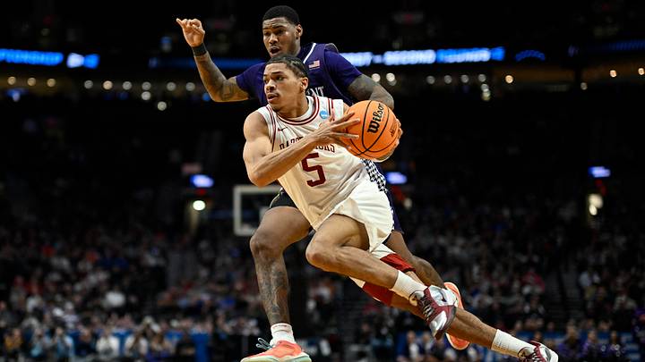 Mar 21, 2026; Portland, OR, USA; Arkansas Razorbacks guard Darius Acuff Jr. (5) drives against High Point Panthers forward Cam'ron Fletcher (11) in the second half during a second round game of the men's 2026 NCAA Tournament at Moda Center. Mandatory Credit: Troy Wayrynen-Imagn Images Mar 21, 2026; Portland, OR, USA; Arkansas Razorbacks guard Darius Acuff Jr. (5) drives against High Point Panthers forward Cam'ron Fletcher (11) in the second half during a second round game of the men's 2026 NCAA Tournament at Moda Center. Mandatory Credit: Troy Wayrynen-Imagn Images
