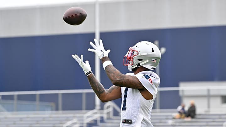 Jun 9, 2025; Foxborough, MA, USA; New England Patriots wide receiver Ja'Lynn Polk (1) makes a catch during minicamp at Gillette Stadium. Mandatory Credit: Eric Canha-Imagn Images