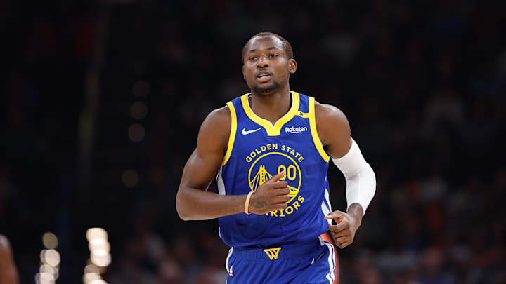 Nov 10, 2024; Oklahoma City, Oklahoma, USA; Golden State Warriors forward Jonathan Kuminga (00) runs down the court against the Oklahoma City Thunder during the second quarter at Paycom Center. Mandatory Credit: Alonzo Adams-Imagn Images