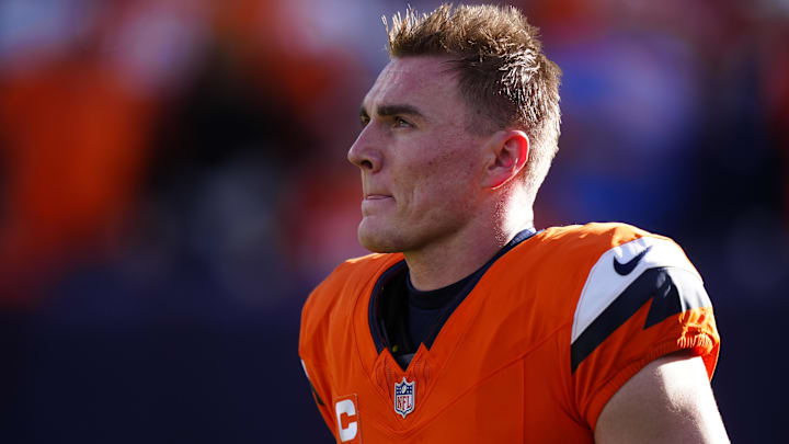 Dec 14, 2025; Denver, Colorado, USA; Denver Broncos quarterback Bo Nix (10) warms up before a game against the Green Bay Packers at Empower Field at Mile High.