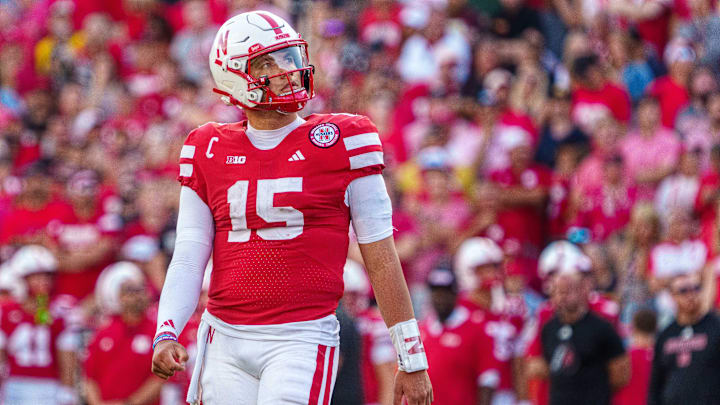 Sep 20, 2025; Lincoln, Nebraska, USA; Nebraska Cornhuskers quarterback Dylan Raiola (15) looks up after a play against the Michigan Wolverines during the fourth quarter at Memorial Stadium. 