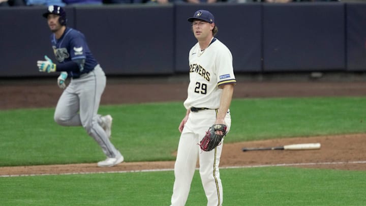 Milwaukee Brewers pitcher Trevor Megill (29) watches an RBI double by Tampa Bay Rays catcher Nick Fortes during the ninth inning of their game Monday, March 30, 2026 American Family Field in Milwaukee, Wisconsin.