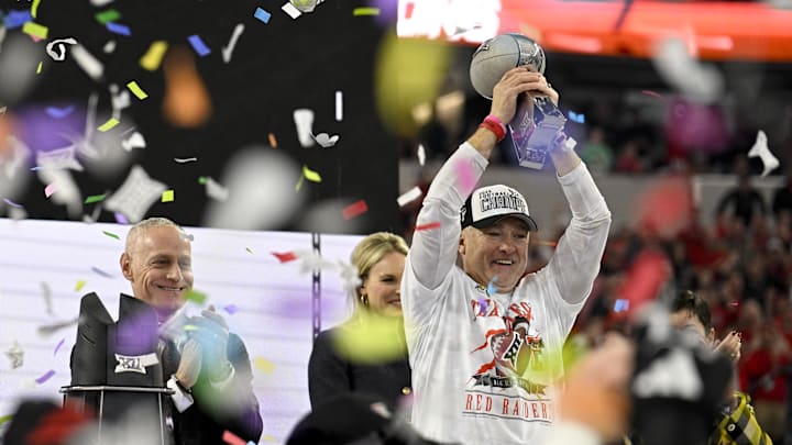 Dec 6, 2025; Arlington, TX, USA; Texas Tech Red Raiders head coach Joey McGuire celebrates after the win against the BYU Cougars at AT&T Stadium. Mandatory Credit: Jerome Miron-Imagn Images