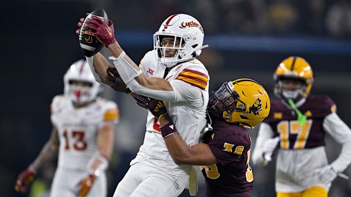 Dec 7, 2024; Arlington, TX, USA; Iowa State Cyclones wide receiver Jayden Higgins (9) catches a pass in front of Arizona State Sun Devils defensive back Kyan McDonald (38) during the second half at AT&T Stadium.  