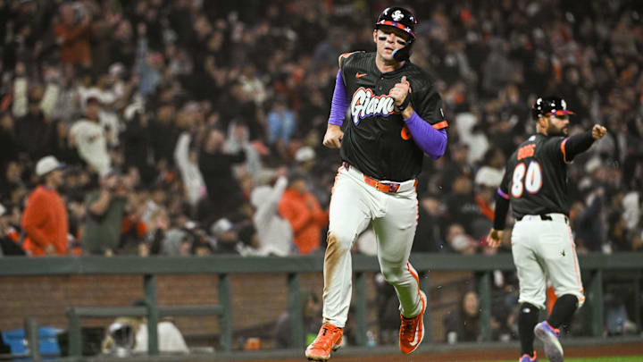 Apr 7, 2026; San Francisco, California, USA; San Francisco Giants catcher Daniel Susac (6) rounds third base on his way to score during the fifth inning of the game against the Philadelphia Phillies at Oracle Park. Mandatory Credit: Ed Szczepanski-Imagn Images