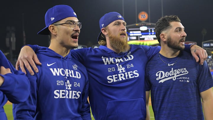 Oct 25, 2024; Los Angeles, California, USA; Los Angeles Dodgers relief pitcher Anthony Banda (43) relief pitcher Michael Kopech (45) and relief pitcher Alex Vesia (51) celebrate defeating the New York Yankees during game one of the 2024 MLB World Series at Dodger Stadium. Mandatory Credit:  Jayne Kamin-Oncea-Imagn Images