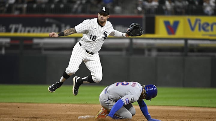 Aug 31, 2024; Chicago, Illinois, USA;  Chicago White Sox second base Jacob Amaya (18) throws to first after forcing New York Mets shortstop Francisco Lindor (12) out during the fifth inning at Guaranteed Rate Field.