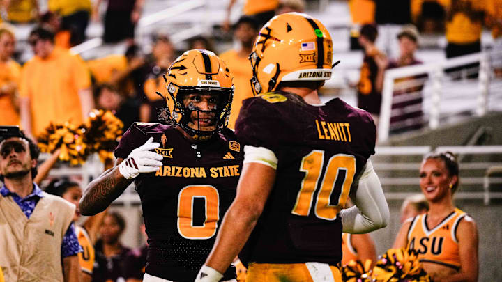 Aug 30, 2025; Tempe, Arizona, USA;  Arizona State Sun Devils wide receiver Jordyn Tyson (0) and  Arizona State Sun Devils quarterback Sam Leavitt (10) celebrates a touchdown in the fourth quarter between Arizona State Sun Devils and Northern Arizona Lumberjacks at Mountain America Stadium. Mandatory Credit: Arianna Grainey-Imagn Images